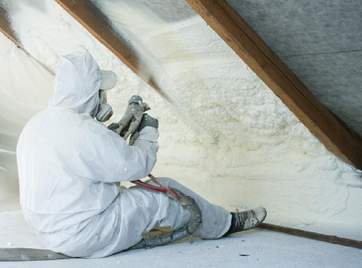Spraying insulation in attic