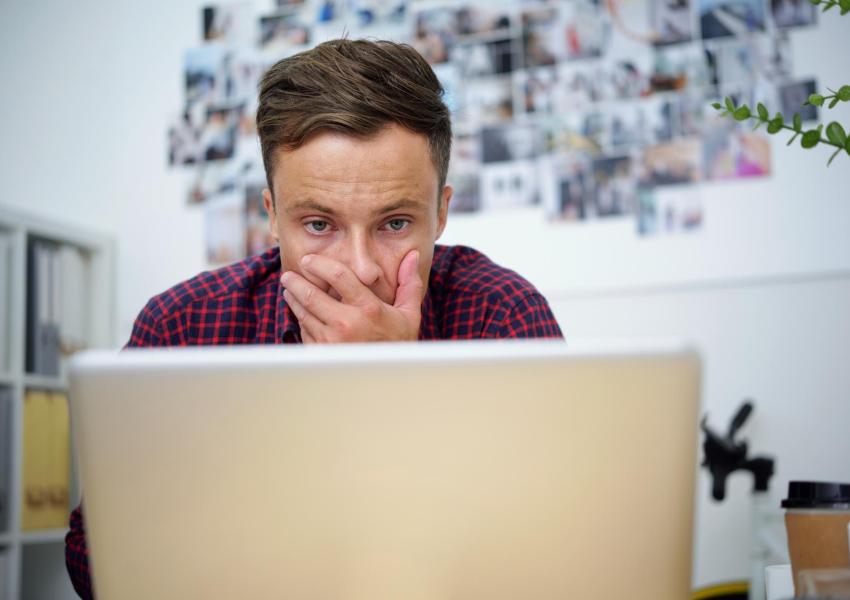 Man looking at computer.